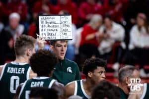 Michigan State Spartans assistant holds up assignments against the Nebraska Cornhuskers in the first half during a college basketball game on Friday, Jan. 2, 2026, in Lincoln, Nebraska. Photo by John S. Peterson.