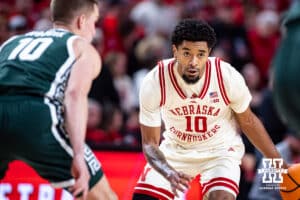 Nebraska Cornhusker guard Jamarques Lawrence (10) dribbles the ball against Michigan State Spartan guard Denham Wojcik (10) in the first half during a college basketball game on Friday, Jan. 2, 2026, in Lincoln, Nebraska. Photo by John S. Peterson.