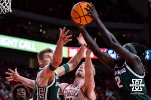 Michigan State Spartan guard Kur Teng (2) grabs the rebound with forward Jaxon Kohler (0) against Nebraska Cornhusker forward Rienk Mast (51) in the first half during a college basketball game on Friday, Jan. 2, 2026, in Lincoln, Nebraska. Photo by John S. Peterson.