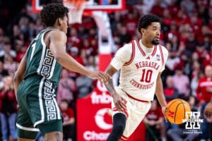 Nebraska Cornhusker guard Jamarques Lawrence (10) dribbles the ball against Michigan State Spartan guard Jeremy Fears Jr. (1) in the first half during a college basketball game on Friday, Jan. 2, 2026, in Lincoln, Nebraska. Photo by John S. Peterson.