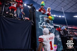 Nebraska Cornhusker defensive back Ceyair Wright (1) tosses a shoe back to a fan after signing it while heading to the locker room after the loss to the Utah Utes during the Las Vegas Bowl game on Wednesday, Dec. 31, 2025, in Las Vegas, NV. Photo by John S. Peterson.