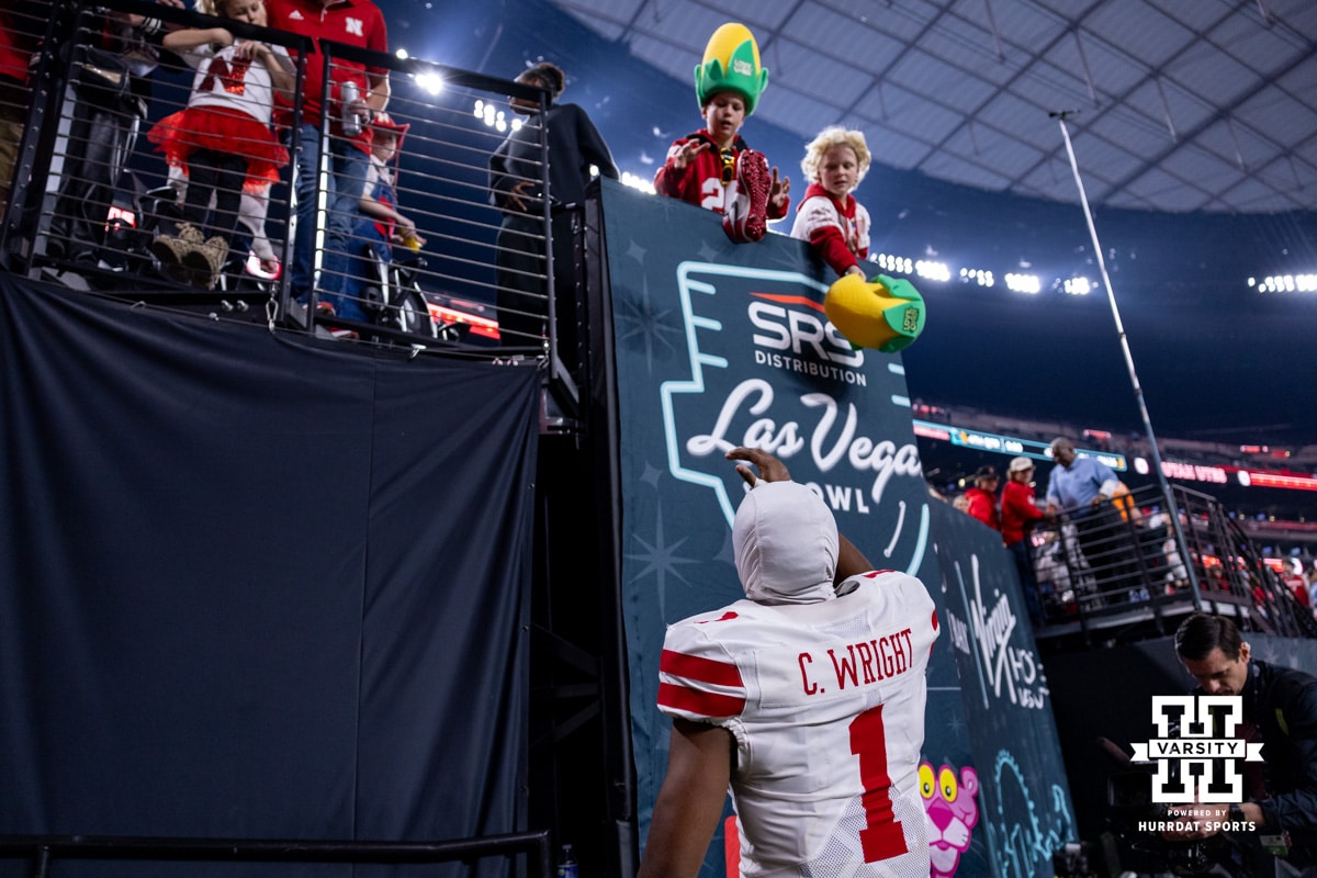 Nebraska Cornhusker defensive back Ceyair Wright (1) tosses a shoe back to a fan after signing it while heading to the locker room after the loss to the Utah Utes during the Las Vegas Bowl game on Wednesday, Dec. 31, 2025, in Las Vegas, NV. Photo by John S. Peterson.