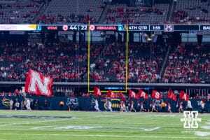 Nebraska Cornhuskers Spirit Squad celebrates a touchdown running the flags in the endzones against the Utah Utes during the Las Vegas Bowl game on Wednesday, Dec. 31, 2025, in Las Vegas, NV. Photo by John S. Peterson.