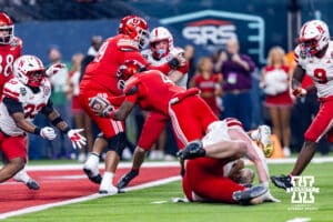 Utah Ute quarterback Devon Dampier (4) dives in for a touchdown against the Nebraska Cornhuskers in the third quarter during the Las Vegas Bowl game on Wednesday, Dec. 31, 2025, in Las Vegas, NV. Photo by John S. Peterson.