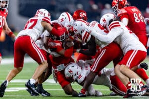 Nebraska Cornhuskers tackle Utah Ute linebacker Lander Barton (8) during the Las Vegas Bowl game on Wednesday, Dec. 31, 2025, in Las Vegas, NV. Photo by John S. Peterson.