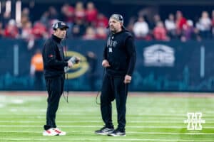 Nebraska Cornhuskers associate head coach Phil Snow and head coach Matt Rhule talk at a break in the action against the Utah Utes during the Las Vegas Bowl game on Wednesday, Dec. 31, 2025, in Las Vegas, NV. Photo by John S. Peterson.