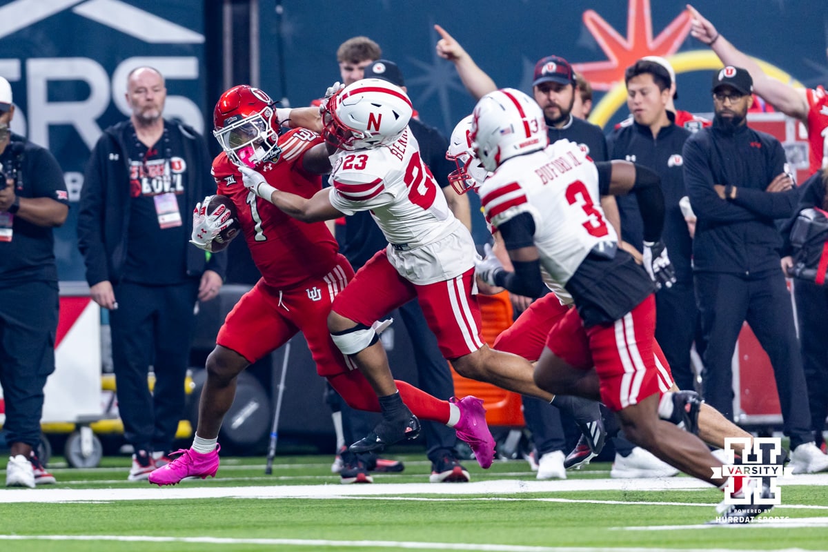 Nebraska Cornhusker defensive back Caleb Benning (23) tackles Utah Ute running back Wayshawn Parker (1) during the Las Vegas Bowl game on Wednesday, Dec. 31, 2025, in Las Vegas, NV. Photo by John S. Peterson.
