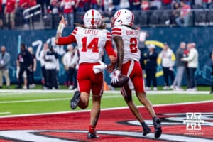 Nebraska Cornhusker quarterback TJ Lateef (14) and wide receiver Jacory Barney Jr. (2) run back to the sideline after a touchdown during the Las Vegas Bowl game on Wednesday, Dec. 31, 2025, in Las Vegas, NV. Photo by John S. Peterson.