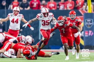 Nebraska Cornhusker running back Mekhi Nelson (35) breaks a tackle running with the ball against the Utah Utes in the first quarter during the Las Vegas Bowl game on Wednesday, Dec. 31, 2025, in Las Vegas, NV. Photo by John S. Peterson.
