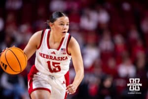 Nebraska Cornhusker guard Kennadi Williams (15) dribbles the ball against the Rutgers Scarlet Knights in the third quarter during a women’s basketball game on Saturday, Feb. 28, 2026, in Lincoln, Nebraska. Photo by John S. Peterson.