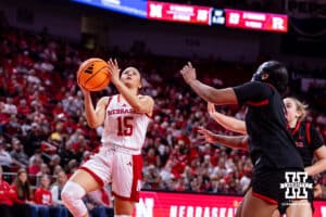 Nebraska Cornhusker guard Kennadi Williams (15) makes a lay up against the Rutgers Scarlet Knights in the first quarter during a women’s basketball game on Saturday, Feb. 28, 2026, in Lincoln, Nebraska. Photo by John S. Peterson.