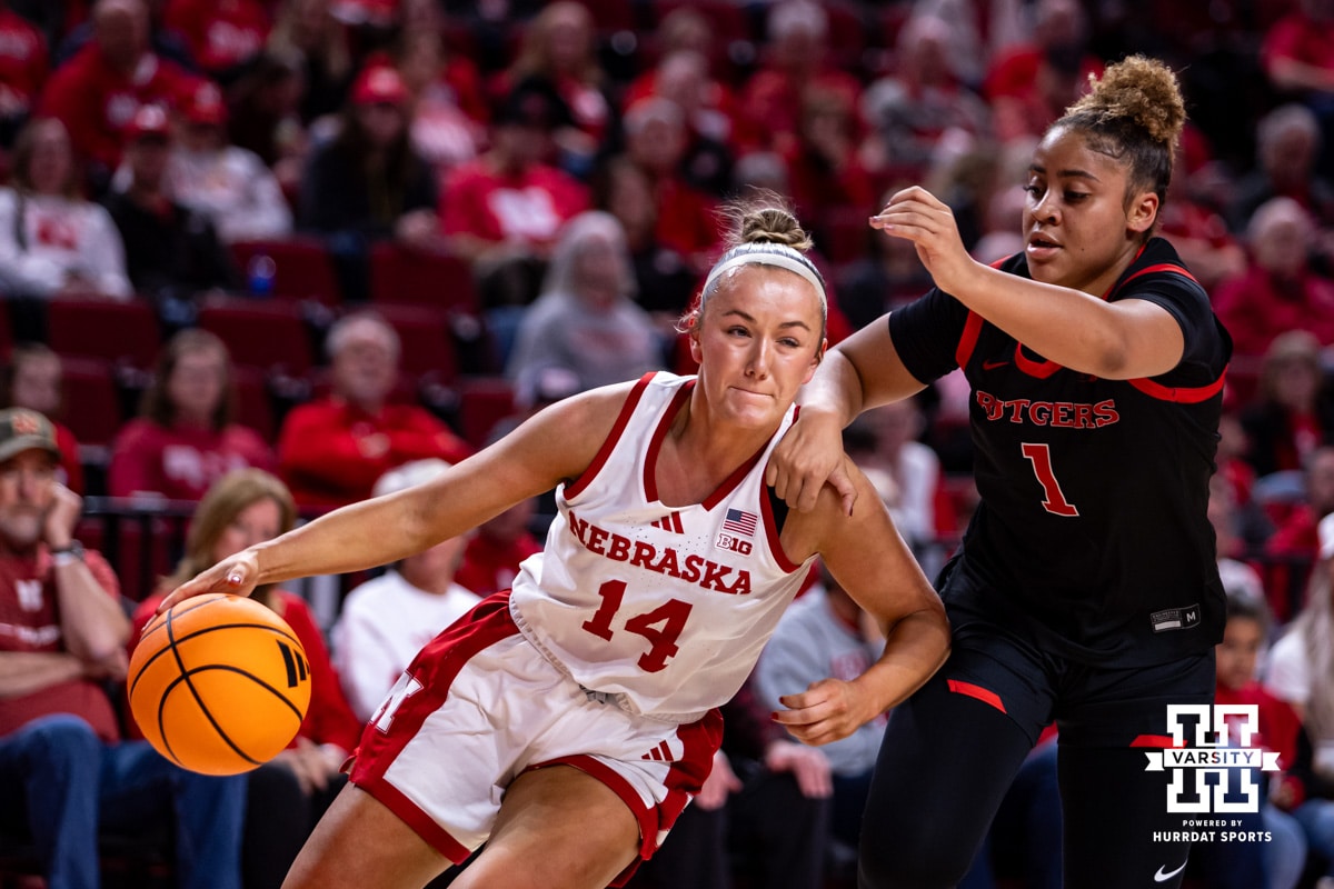 Nebraska Cornhusker guard Callin Hake (14) drives to the basket against Rutgers Scarlet Knight guard Lauryn Swann (1) in the first quarter during a women’s basketball game on Saturday, Feb. 28, 2026, in Lincoln, Nebraska. Photo by John S. Peterson.
