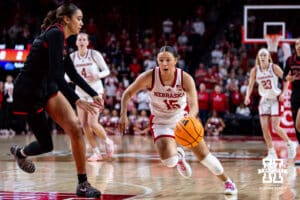 Nebraska Cornhusker guard Kennadi Williams (15) dribbles the ball against the Rutgers Scarlet Knights in the first quarter during a women’s basketball game on Saturday, Feb. 28, 2026, in Lincoln, Nebraska. Photo by John S. Peterson.