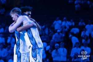Creighton Bluejay seniors Josh Dix (4) and Nik Graves (5) hug after a college basketball game against Providence on Feb 28, 2026, in Omaha, Nebraska. Photo by Brandon Tiedemann
