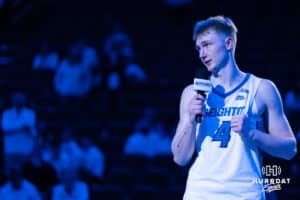 Creighton Bluejay Josh Dix (4) talks after a college basketball game against Providence on Feb 28, 2026, in Omaha, Nebraska. Photo by Brandon Tiedemann
