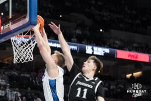 Creighton Bluejay Josh Dix (4) dunks during a college basketball game against Providence on Feb 28, 2026, in Omaha, Nebraska. Photo by Brandon Tiedemann
