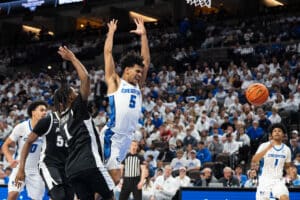 Creighton Bluejay Nik Graves (5) gets fouled during a college basketball game against Providence on Feb 28, 2026, in Omaha, Nebraska. Photo by Brandon Tiedemann