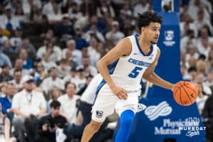 Creighton Bluejay Nik Graves (5) leads the fast break during a college basketball game against Providence on Feb 28, 2026, in Omaha, Nebraska. Photo by Brandon Tiedemann