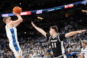 Creighton Bluejay Josh Dix (4) pulls up to shoot during a college basketball game against Providence on Feb 28, 2026, in Omaha, Nebraska. Photo by Brandon Tiedemann