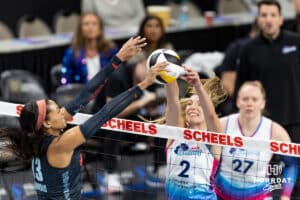 Omaha Supernovas Sydney Hilley (2) joust at the net against Atlanta Vibe Leah Edmond during a professional volleyball match on Thursday, Feb. 26, 2026, in Omaha, Nebraska. Photo by John S. Peterson.