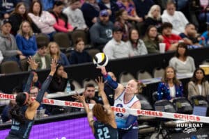 Omaha Supernovas Emily Londot (27) spikes the ball against Atlanta Vibe Leah Edmond and Khori Louis (22) during a professional volleyball match on Thursday, Feb. 26, 2026, in Omaha, Nebraska. Photo by John S. Peterson.