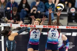 Omaha Supernovas Toyosi Onabanjo (21) reaches for the ball with Sydney Hilley (2) against Atlanta Vibe Leah Edmond in the second set during a professional volleyball match on Thursday, Feb. 26, 2026, in Omaha, Nebraska. Photo by John S. Peterson.