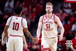 Nebraska Cornhusker forward Rienk Mast (51) gives Jamarques Lawrence five against the Maryland Terrapins in the second half during a college basketball game on Wednesday, Feb. 25, 2026, in Lincoln, Nebraska.
