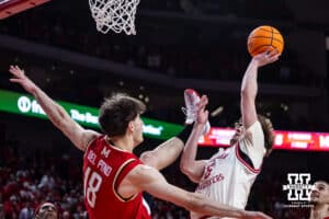 Nebraska Cornhusker forward Braden Frager (5) makes a lay up against Maryland Terrapin guard Guillermo del Pino (18) in the first half during a college basketball game on Wednesday, Feb. 25, 2026, in Lincoln, Nebraska.