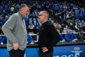 Creighton Bluejay head coach Greg McDermott and DePaul head coach Chris Holtmann meet during a college basketball game on Feb 25, 2026, in Omaha, Nebraska. Photo by Brandon Tiedemann