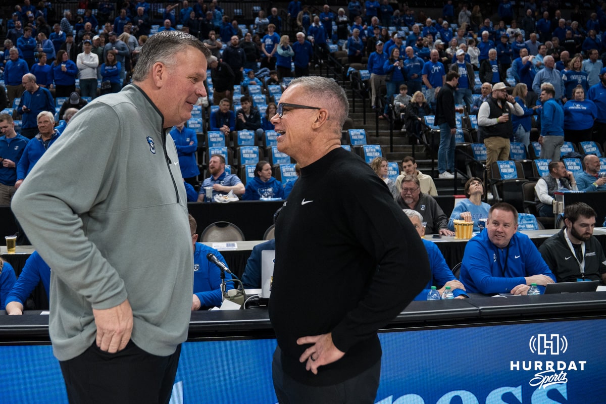 Creighton Bluejay head coach Greg McDermott and DePaul head coach Chris Holtmann meet during a college basketball game on Feb 25, 2026, in Omaha, Nebraska. Photo by Brandon Tiedemann