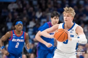 Creighton Bluejay Ty Davis (9) passes the ball during a college basketball game against DePaul on Feb 25, 2026, in Omaha, Nebraska. Photo by Brandon Tiedemann