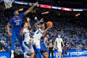 Creighton Bluejay Nik Graves (5) gets fouled during a college basketball game against DePaul on Feb 25, 2026, in Omaha, Nebraska. Photo by Brandon Tiedemann