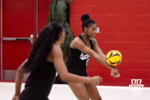 Nebraska Cornhuskers Keoni Williams (10) digs the ball against the Ottawa Braves during a college beach volleyball match on Monday, Feb. 23, 2026, in Lincoln, NE. Photo by John S. Peterson.