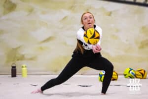 Nebraska Cornhusker Olivia Mauch (1) digs the ball against the Ottawa Braves during a college beach volleyball match on Monday, Feb. 23, 2026, in Lincoln, NE. Photo by John S. Peterson.