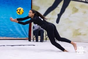 Nebraska Cornhusker Harper Murray (2) digs the ball against the Ottawa Braves during a college beach volleyball match on Monday, Feb. 23, 2026, in Lincoln, NE. Photo by John S. Peterson.