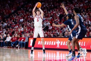 Nebraska Cornhusker forward Braden Frager (5) makes a three point shot against the Penn State Nittany Lions in the second half during a college basketball game on Saturday, Feb. 21, 2026, in Lincoln, NE. Photo by John S. Peterson.