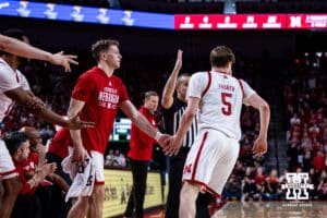 Nebraska Cornhusker guard Cale Jacobsen (31) gives Braden Frager five after making a three point basket against the Penn State Nittany Lions in the second half during a college basketball game on Saturday, Feb. 21, 2026, in Lincoln, NE. Photo by John S. Peterson.