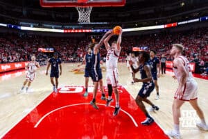 Nebraska Cornhusker forward Braden Frager (5) makes a lay up against Penn State Nittany Lion guard Dominick Stewart (7) in the second half during a college basketball game on Saturday, Feb. 21, 2026, in Lincoln, NE. Photo by John S. Peterson.