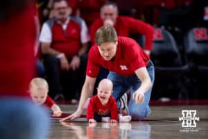 One baby not too happy about the baby race at halftime during a college basketball game between the Nebraska Cornhuskers and the Penn State Nittany Lions on Saturday, Feb. 21, 2026, in Lincoln, NE. Photo by John S. Peterson.