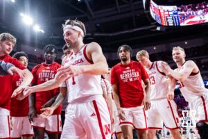Nebraska Cornhusker guard Sam Hoiberg (1) leads the Huskers to the locker room at halftime against the Penn State Nittany Lions during a college basketball game on Saturday, Feb. 21, 2026, in Lincoln, NE. Photo by John S. Peterson.