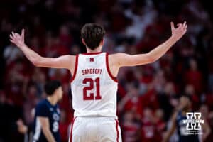 Nebraska Cornhusker forward Pryce Sandfort (21) celebrates making a three point basket against the Penn State Nittany Lions in the first half during a college basketball game on Saturday, Feb. 21, 2026, in Lincoln, NE. Photo by John S. Peterson.