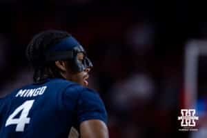 Penn State Nittany Lion guard Kayden Mingo (4) wears a facemask against the Nebraska Cornhuskers during a college basketball game on Saturday, Feb. 21, 2026, in Lincoln, NE. Photo by John S. Peterson.