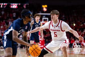 Nebraska Cornhusker forward Braden Frager (5) guards Penn State Nittany Lion guard Kayden Mingo (4) in the first half during a college basketball game on Saturday, Feb. 21, 2026, in Lincoln, NE. Photo by John S. Peterson.