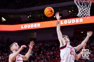 Nebraska Cornhusker forward Pryce Sandfort (21) tries to reach for the ball against the Penn State Nittany Lions in the first half during a college basketball game on Saturday, Feb. 21, 2026, in Lincoln, NE. Photo by John S. Peterson.