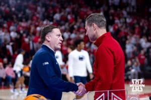 Nebraska Cornhusker head coach Fred Hoiberg shakes hands with Penn State Nittany Lion head coach Mike Rhoades before the start of a college baskerball game on Saturday, Feb. 21, 2026, in Lincoln, NE.