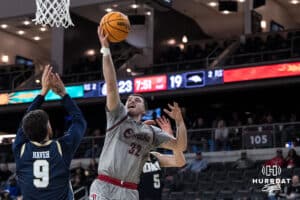 Omaha Mavericks Tony Osburn (32) shoots a layup during a college basketball game against Oral Roberts on Feb 18, 2026, in Omaha, Nebraska. Photo by Brandon Tiedemann