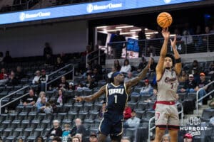 Omaha Mavericks Lance Waddles (7) shoots a three pointer during a college basketball game against Oral Roberts on Feb 18, 2026, in Omaha, Nebraska. Photo by Brandon Tiedemann