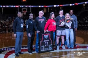 Omaha Mavericks Tony Osburn (32) and family during a college basketball game against Oral Roberts on Feb 18, 2026, in Omaha, Nebraska. Photo by Brandon Tiedemann