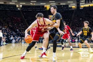 Nebraska Cornhusker forward Berke Buyuktuncel (9) dribbles the ball against the Iowa Hawkeyes in the second half during a college basketball game on Tuesday, Feb. 17, 2026, in Iowa City, Iowa. Photo by John S. Peterson.