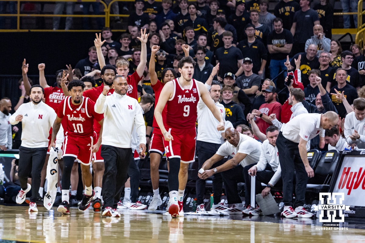 Nebraska Cornhuskers bench reacts to a three point basket by Cale Jacobsen against the Iowa Hawkeyes in the first half during a college basketball game on Tuesday, Feb. 17, 2026, in Iowa City, Iowa. Photo by John S. Peterson.